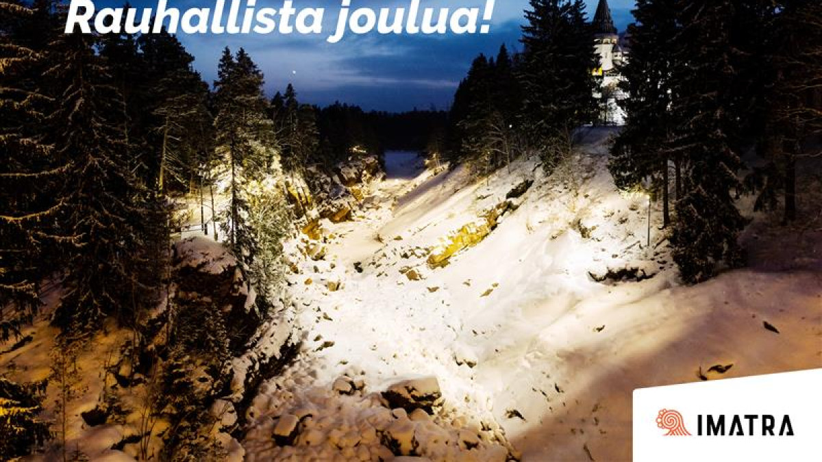 Imatrankosken uoma iltavalaistuksessa, kuvassa teksti Rauhallista joulua ja Imatran kaupungin tunnus.