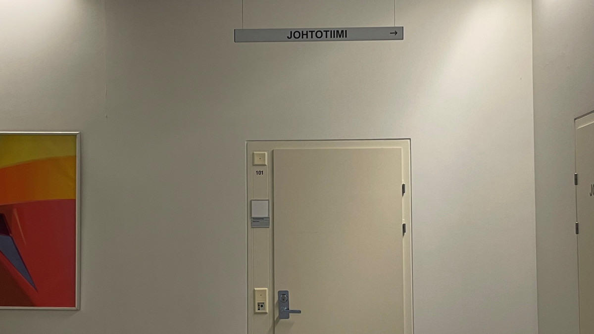 Johtotiimin ovi