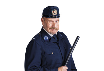 Näytelmän hahmo Reinikainen.